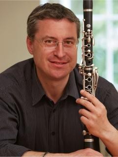 Portrait Andrej Starcenko mit Klarinette